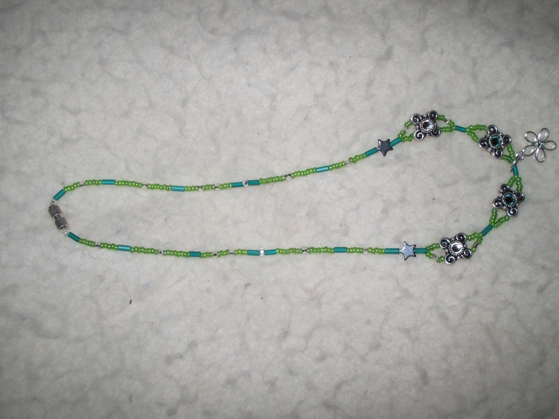 Green and silver beaded necklace with Swarovski crystal accent beads and pendant